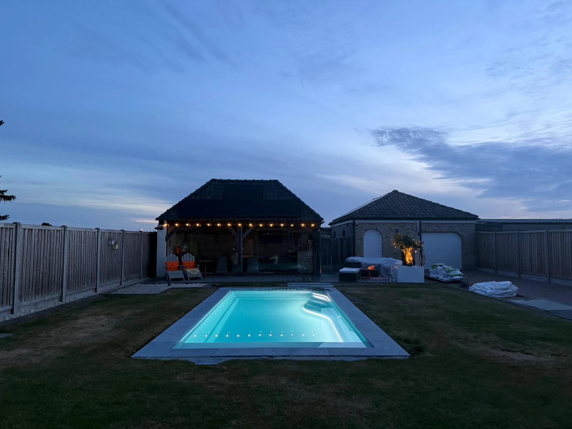 Single 78 WaterRows pool illuminated at dusk